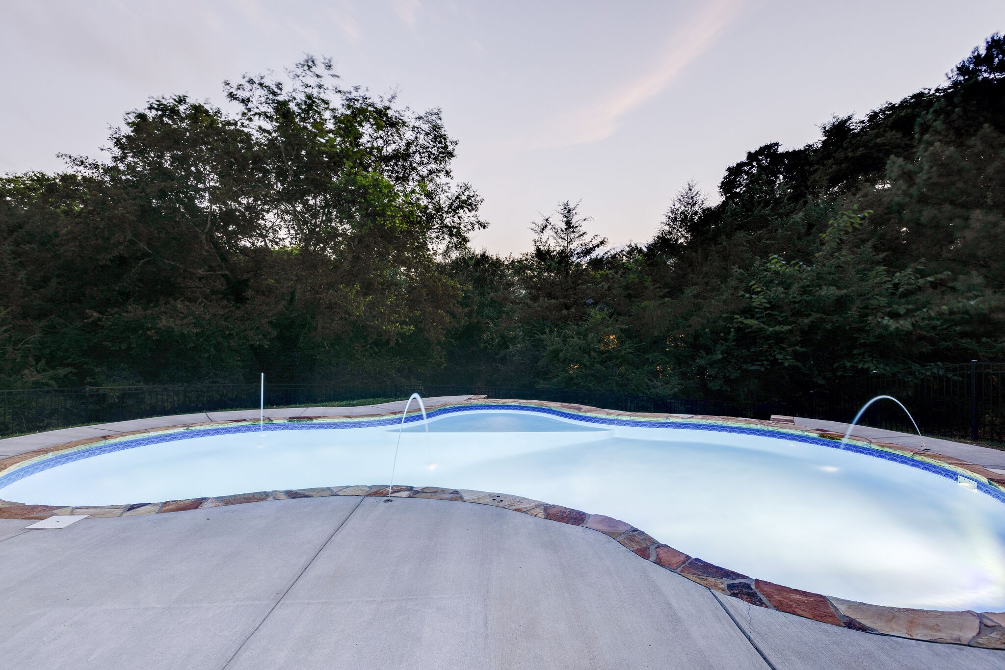 211 Hillside Drive Franklin, TN 37067 - Photo 31 of 43 a view of a swimming pool with a yard