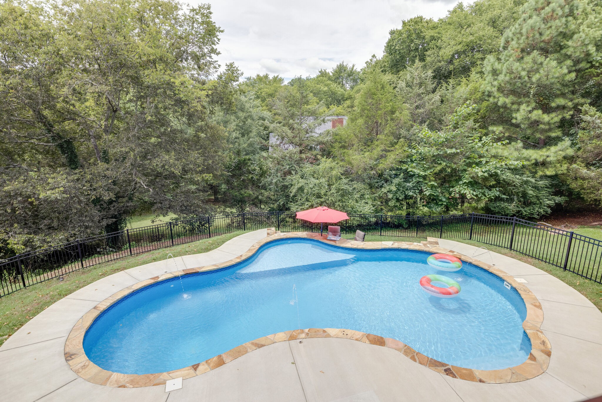 211 Hillside Drive Franklin, TN 37067 - Photo 33 of 43 a view of a swimming pool with a yard