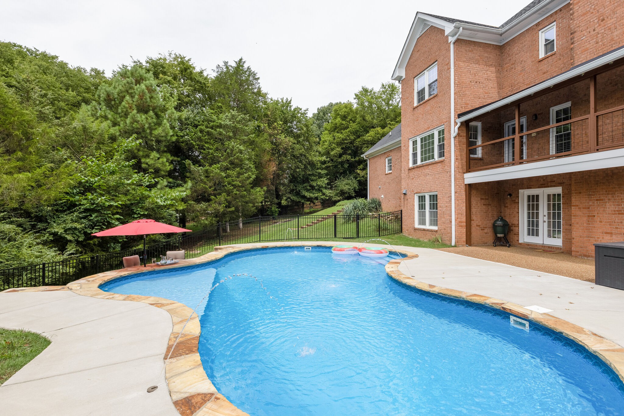 211 Hillside Drive Franklin, TN 37067 - Photo 34 of 43 a view of a swimming pool with an outdoor seating