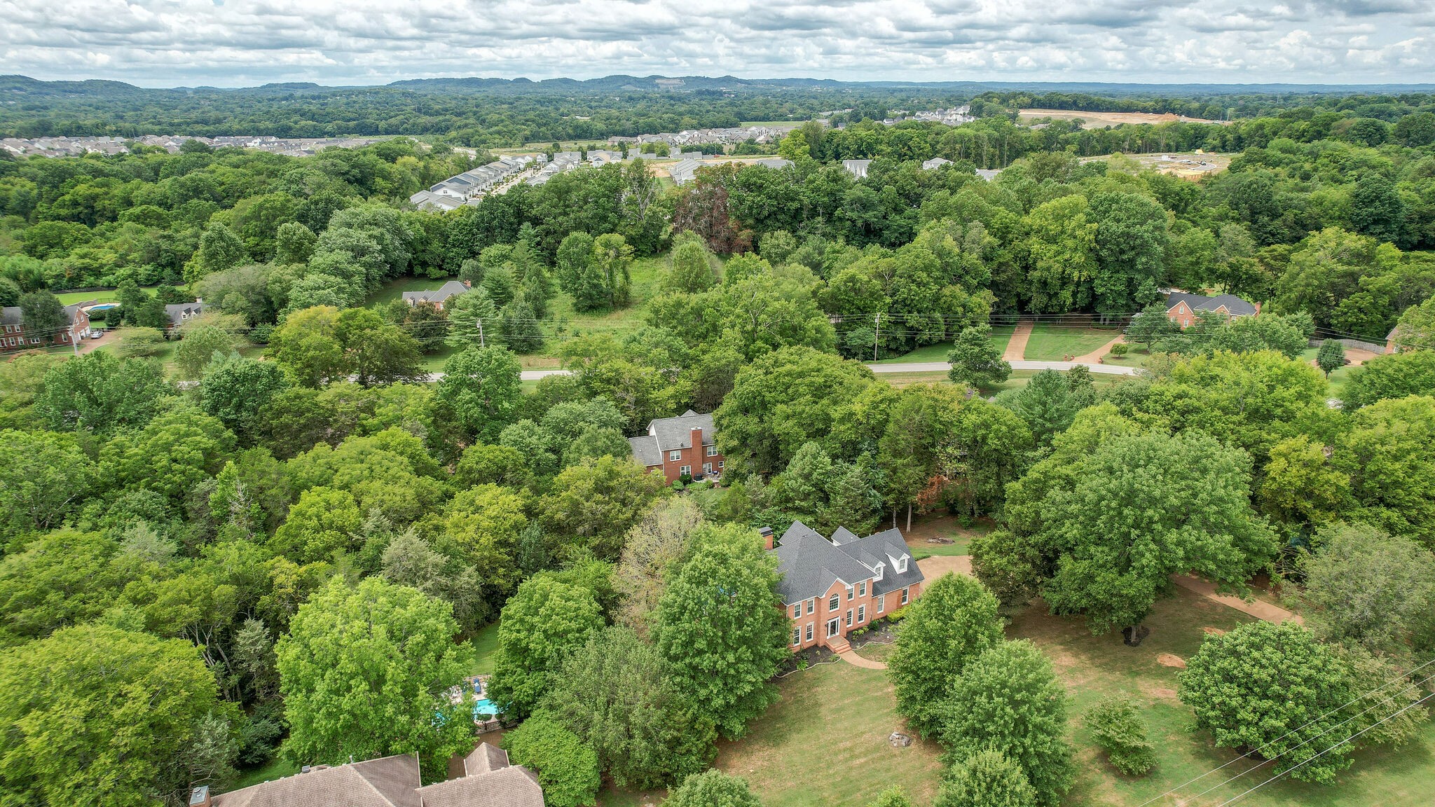 211 Hillside Drive Franklin, TN 37067 - Photo 36 of 43 a view of a garden with a lake