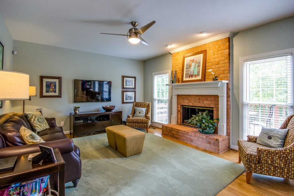 211 Hillside Drive Franklin, TN 37067 - Photo 6 of 43 a living room with furniture and a fireplace