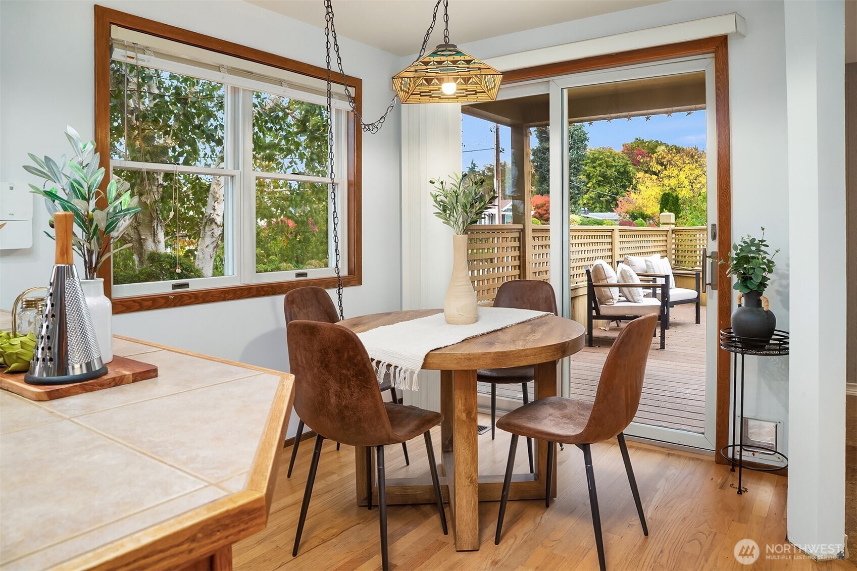 637 Elm Place Edmonds, WA 98020 - Photo 11 of 34 a dining room with furniture window wooden floor