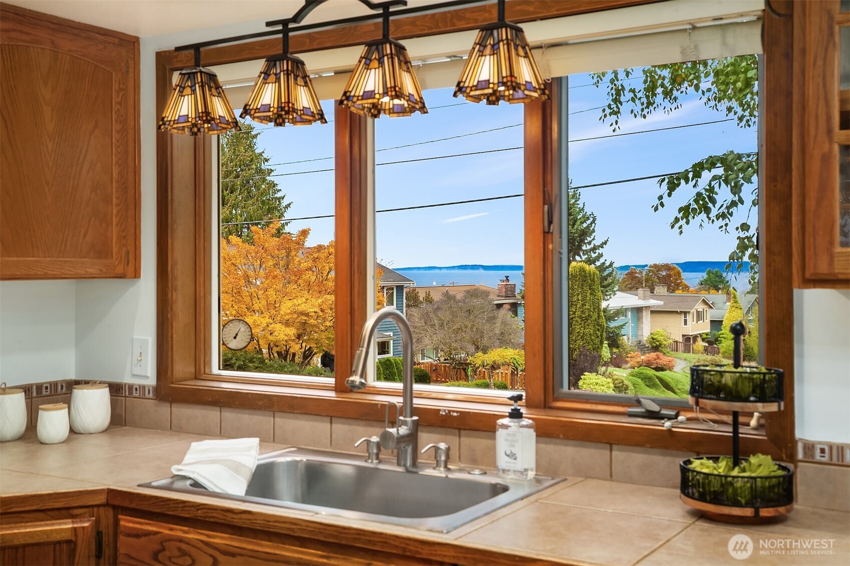 637 Elm Place Edmonds, WA 98020 - Photo 15 of 34 a kitchen with a sink and a large window