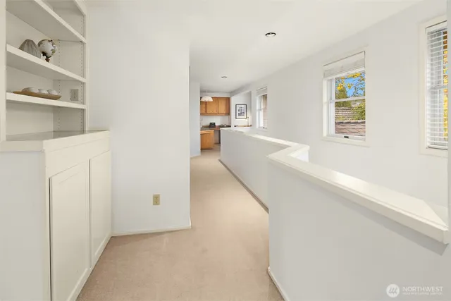 a view of a living room with windows
