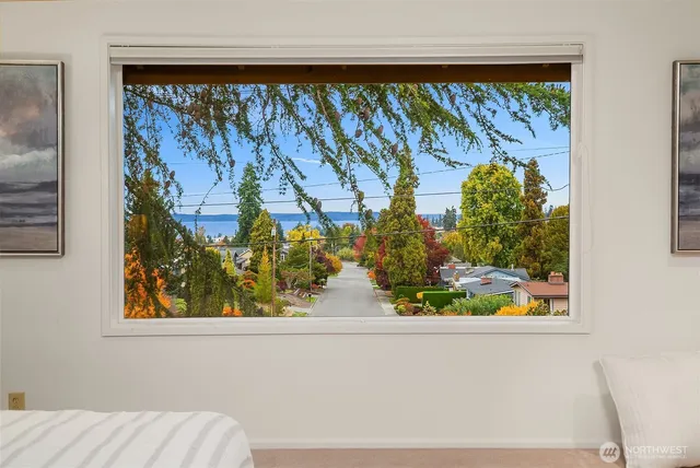 a view of a street with a building in the background