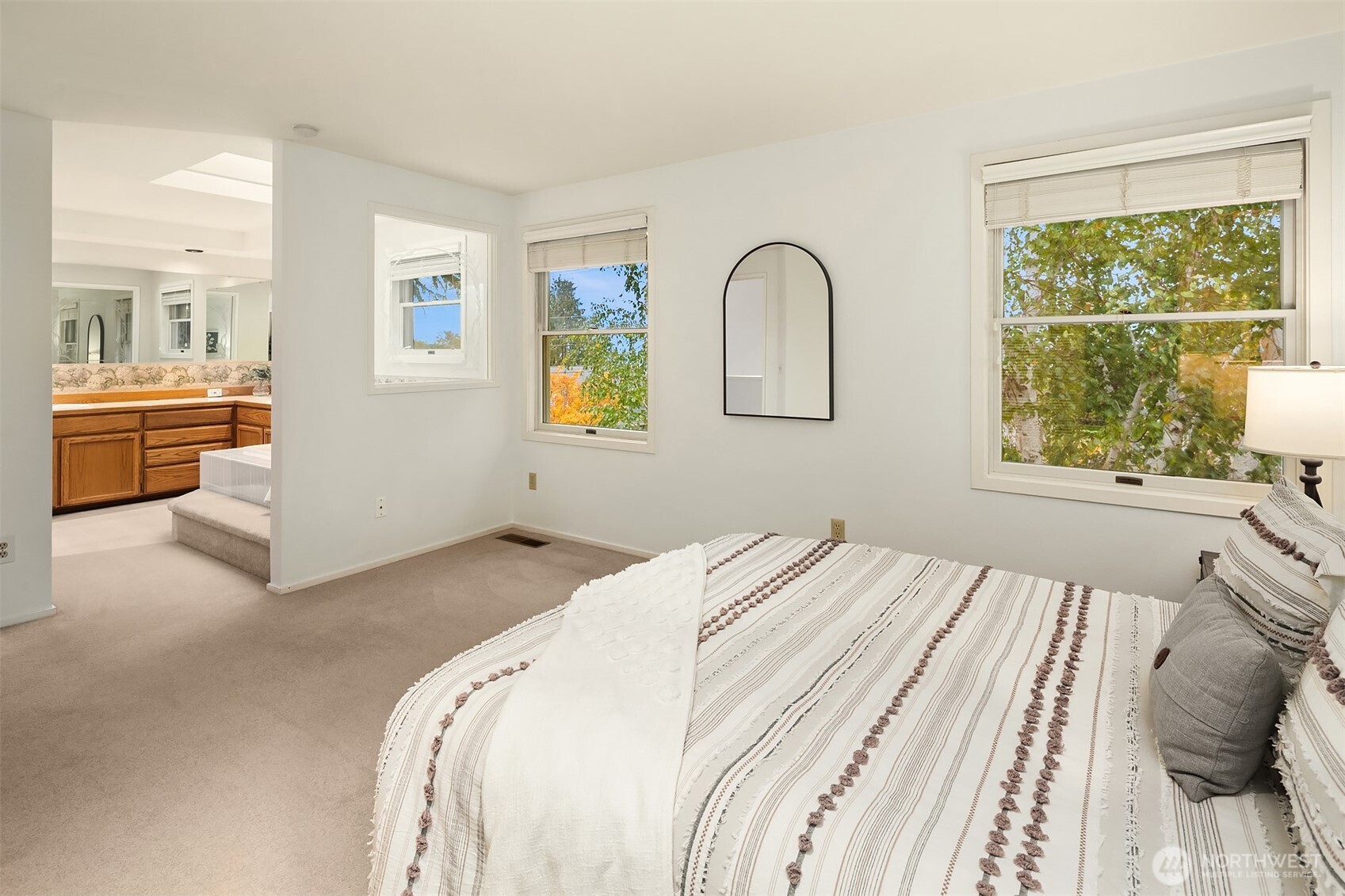 637 Elm Place Edmonds, WA 98020 - Photo 27 of 34 a bedroom with a bed and a large window