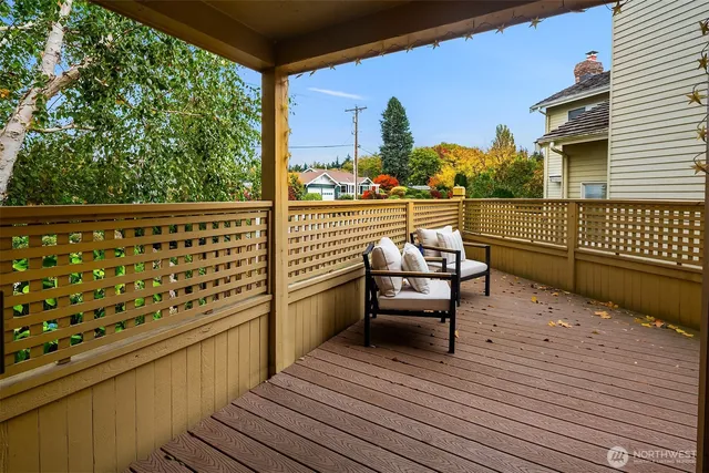 a view of a patio with a table and chairs