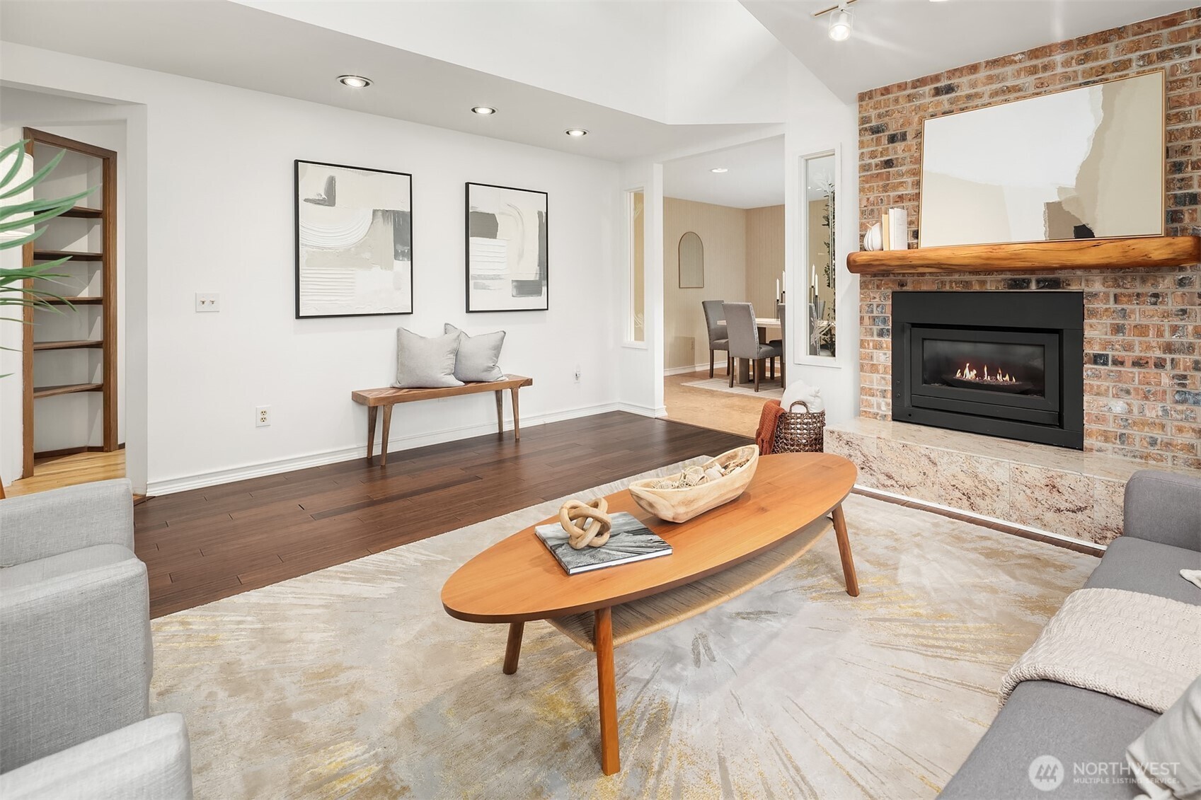 637 Elm Place Edmonds, WA 98020 - Photo 7 of 34 a living room with furniture a fireplace and a table