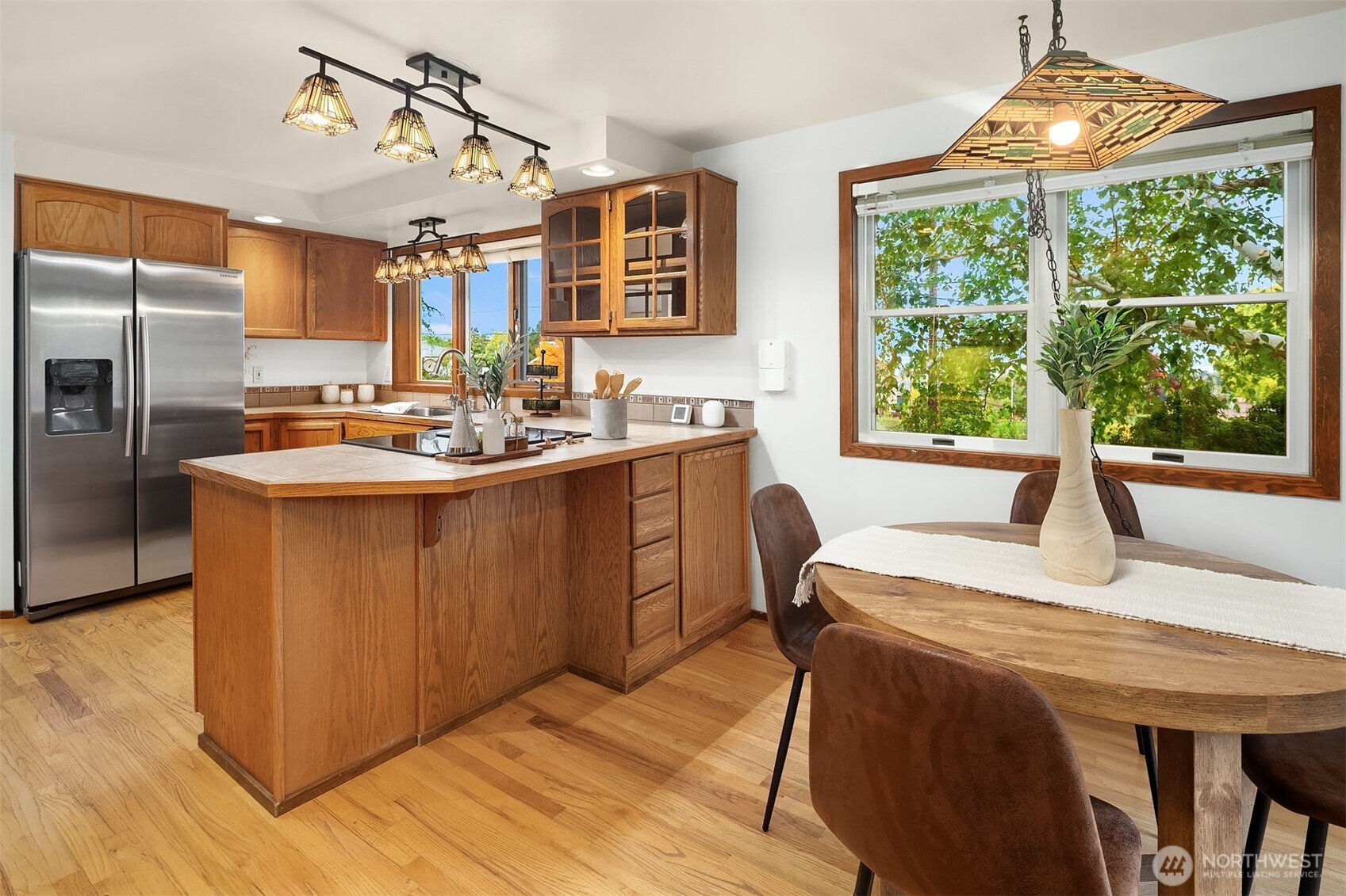 637 Elm Place Edmonds, WA 98020 - Photo 10 of 34 a kitchen with a sink a counter top space and stainless steel appliances