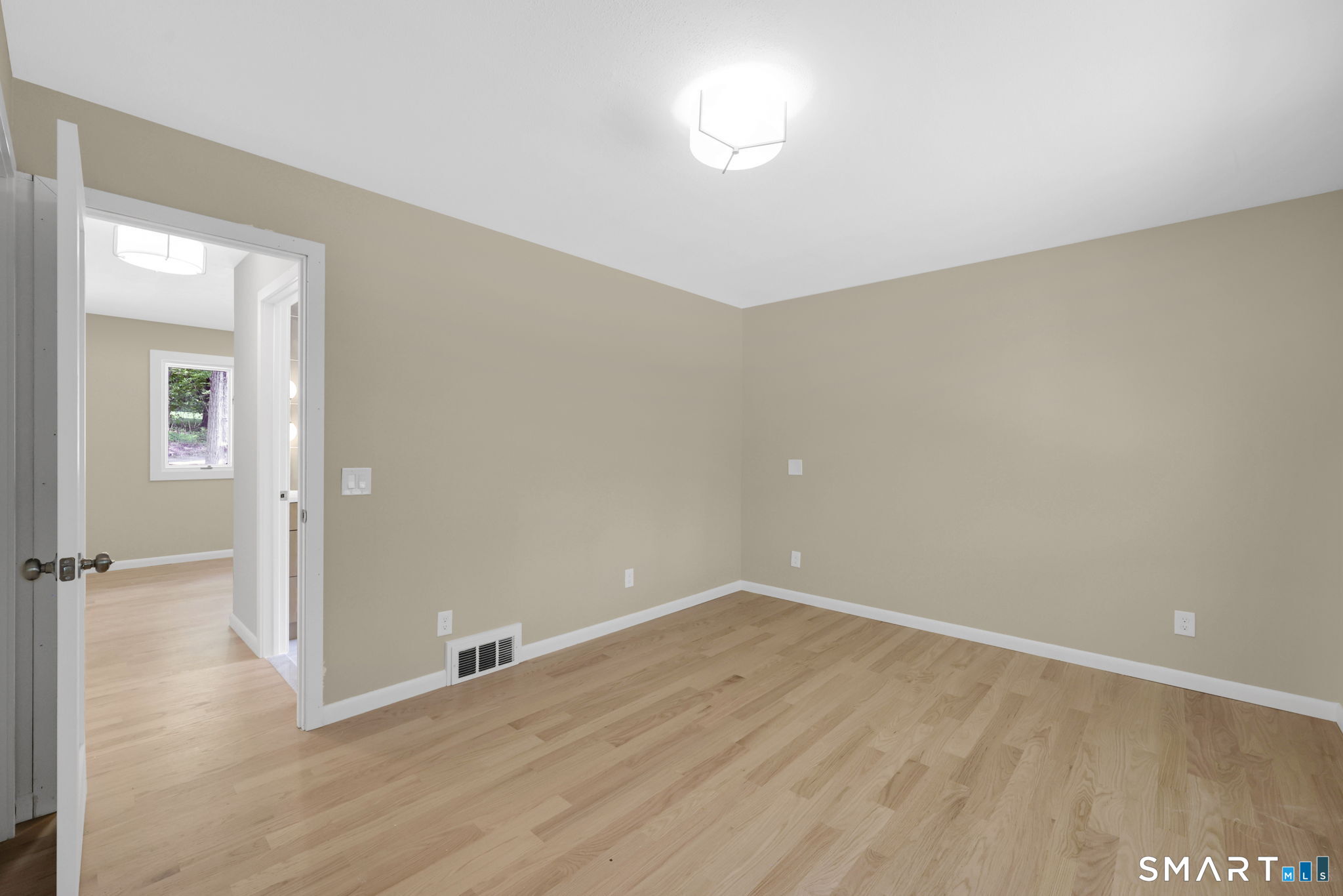 49 Millstone Road Glastonbury, CT 06033 - Photo 13 of 39 a view of a room with wooden floor