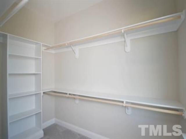 102 Philip's Square Chapel Hill, NC 27516 - Photo 16 of 25 a view of a room with racks on the wall