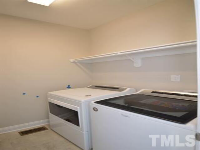 102 Philip's Square Chapel Hill, NC 27516 - Photo 20 of 25 a utility room with dryer and washer