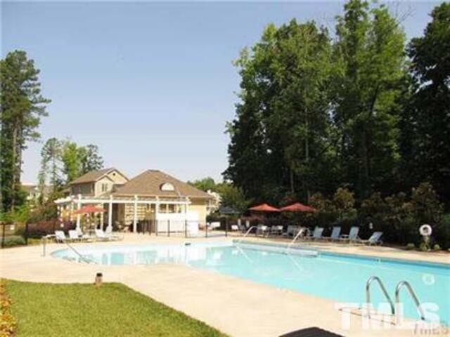 102 Philip's Square Chapel Hill, NC 27516 - Photo 25 of 25 a view of a house with garden space and a mountain view
