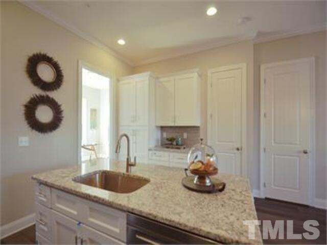 102 Philip's Square Chapel Hill, NC 27516 - Photo 7 of 25 a kitchen with sink and a window