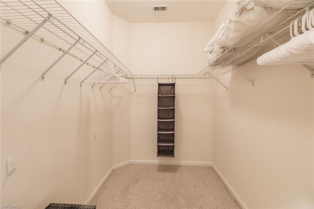 3940 Deer Crossing Court, Unit 4203 Naples, FL 34114 - Photo 33 of 46 a view of small space with racks on the wall