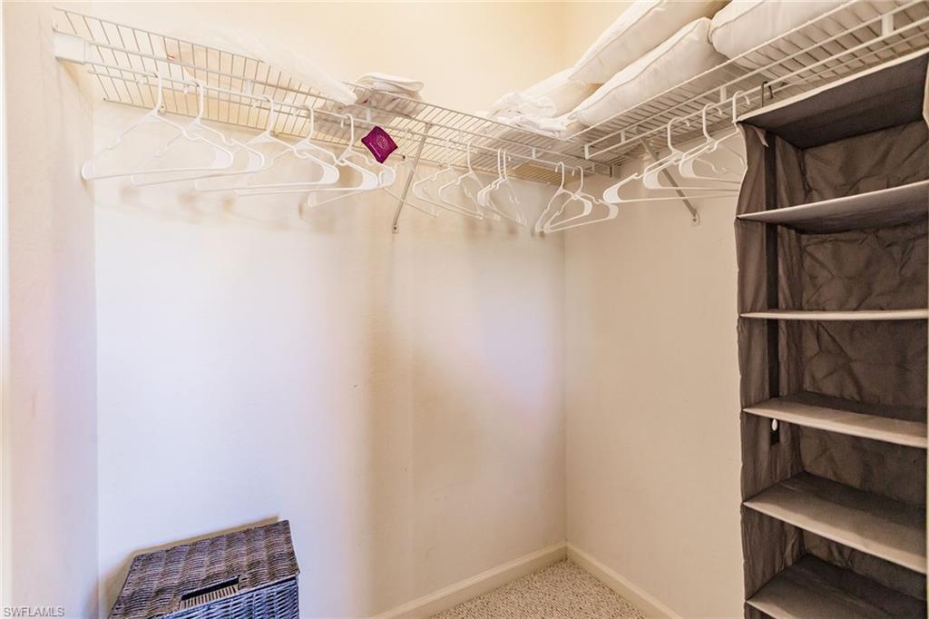 3940 Deer Crossing Court, Unit 4203 Naples, FL 34114 - Photo 37 of 46 a utility room with dryer and washer