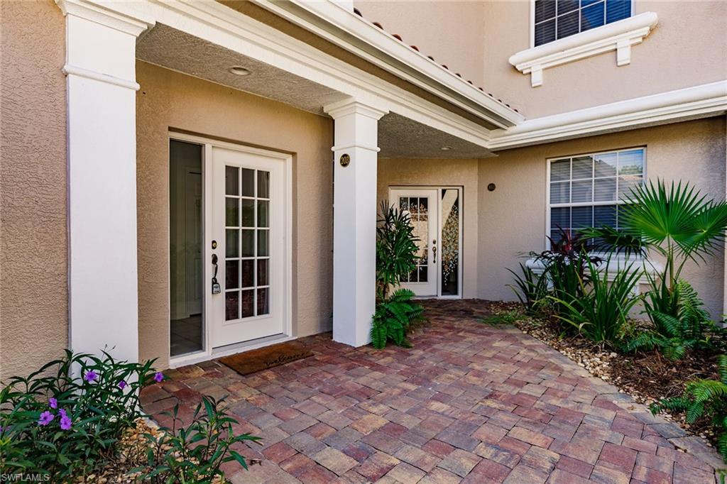 3940 Deer Crossing Court, Unit 4203 Naples, FL 34114 - Photo 7 of 46 a view of a entrance of the house