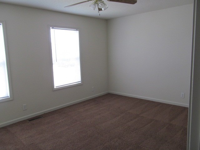 217 Tree Line Drive Oak Grove, KY 42262 - Photo 8 of 13 an empty room with a window