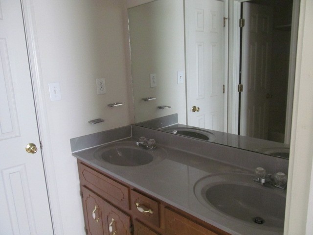217 Tree Line Drive Oak Grove, KY 42262 - Photo 10 of 13 a bathroom with a sink and a mirror