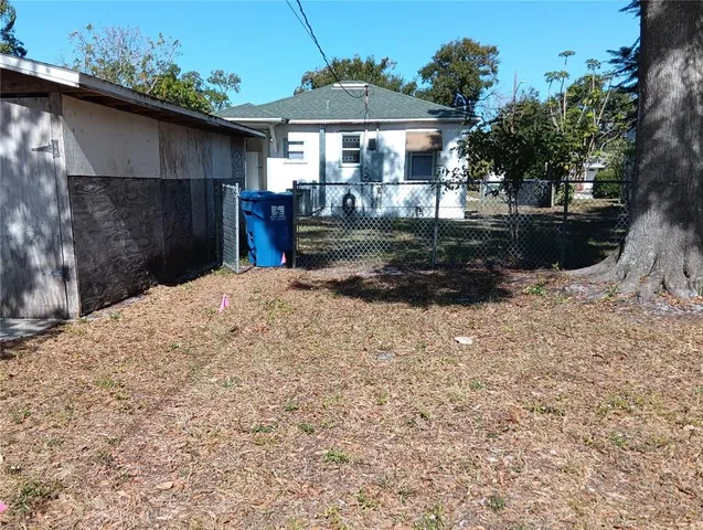 a view of a backyard with a patio