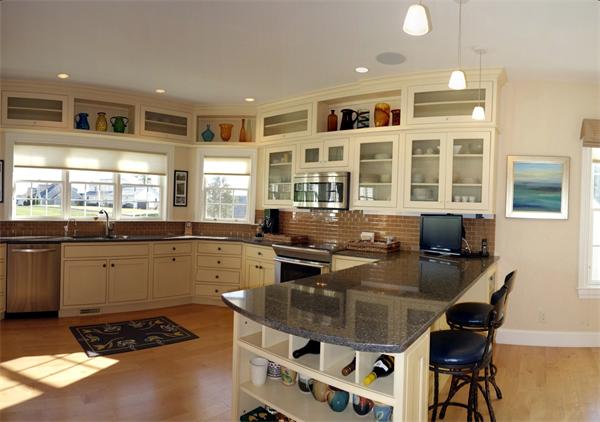 20 Bridge Road, Unit 29 Northampton, MA 01062 - Photo 12 of 30 a kitchen with a dining table and chairs