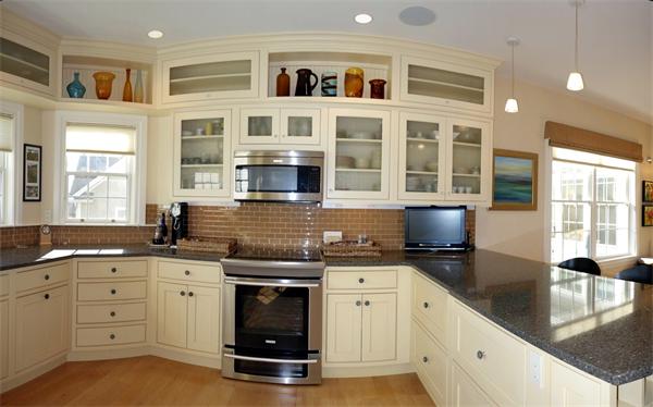 20 Bridge Road, Unit 29 Northampton, MA 01062 - Photo 13 of 30 a kitchen with stainless steel appliances granite countertop a sink stove and cabinets
