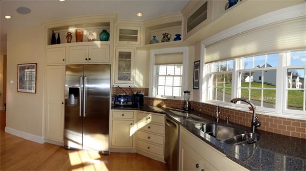 20 Bridge Road, Unit 29 Northampton, MA 01062 - Photo 14 of 30 a kitchen with stainless steel appliances granite countertop a sink and a refrigerator