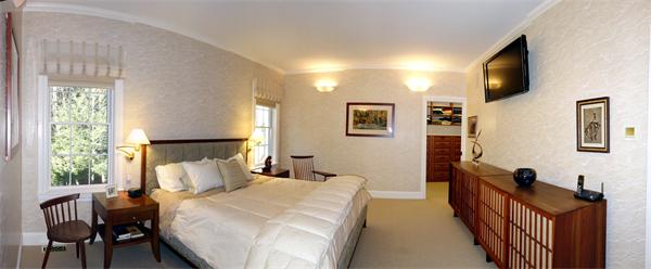 20 Bridge Road, Unit 29 Northampton, MA 01062 - Photo 16 of 30 a bed room with a bed and a tv