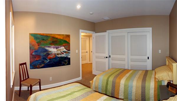 20 Bridge Road, Unit 29 Northampton, MA 01062 - Photo 28 of 30 a bedroom with a bed and a painting on the wall