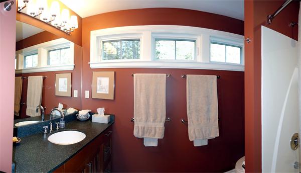 20 Bridge Road, Unit 29 Northampton, MA 01062 - Photo 29 of 30 a bathroom with a granite countertop sink and a mirror