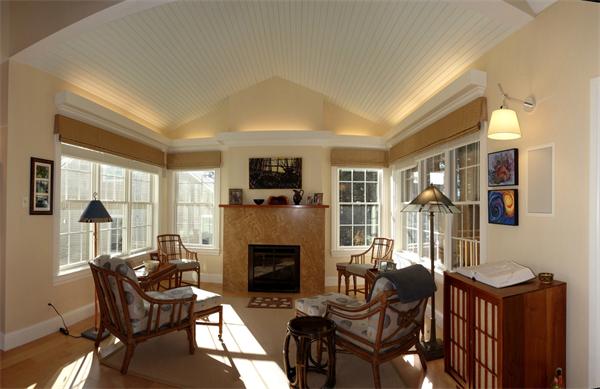 20 Bridge Road, Unit 29 Northampton, MA 01062 - Photo 6 of 30 a living room with furniture a fireplace and a flat screen tv