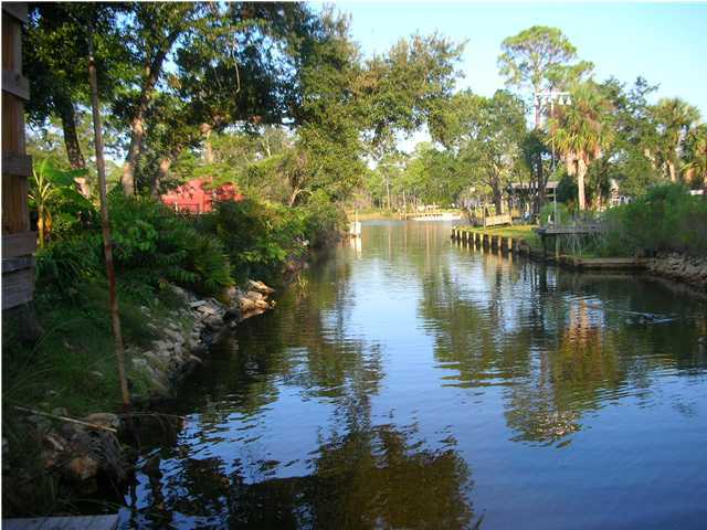 82 East Wild Briar Road Santa Rosa Beach, FL 32459 - Photo 24 of 26 a view of a lake with houses