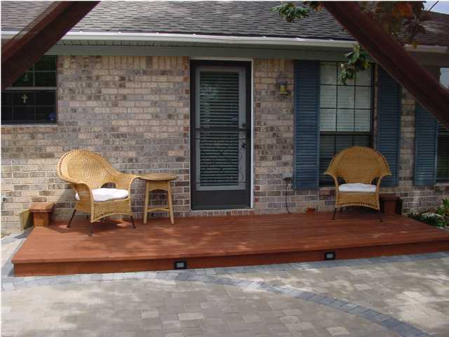 82 East Wild Briar Road Santa Rosa Beach, FL 32459 - Photo 3 of 26 a backyard of a house with seating space