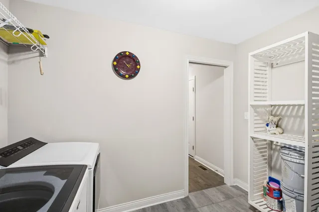 a room with a cabinets and wooden floor