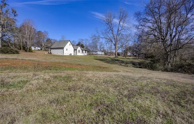 a view of a lake from a yard