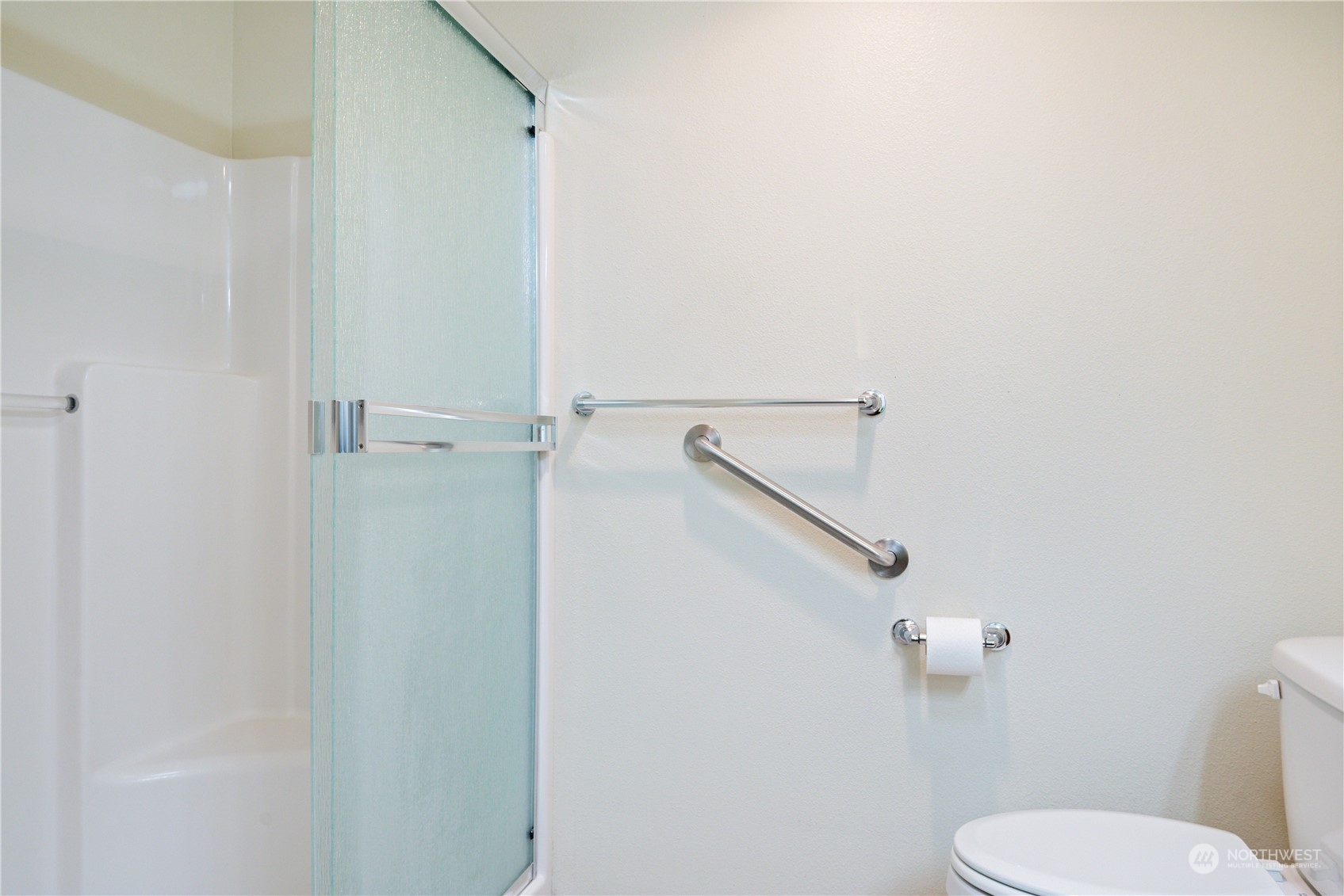 8 Willow Pointe Loop Longview, WA 98632 - Photo 15 of 29 a white toilet sitting next to a shower