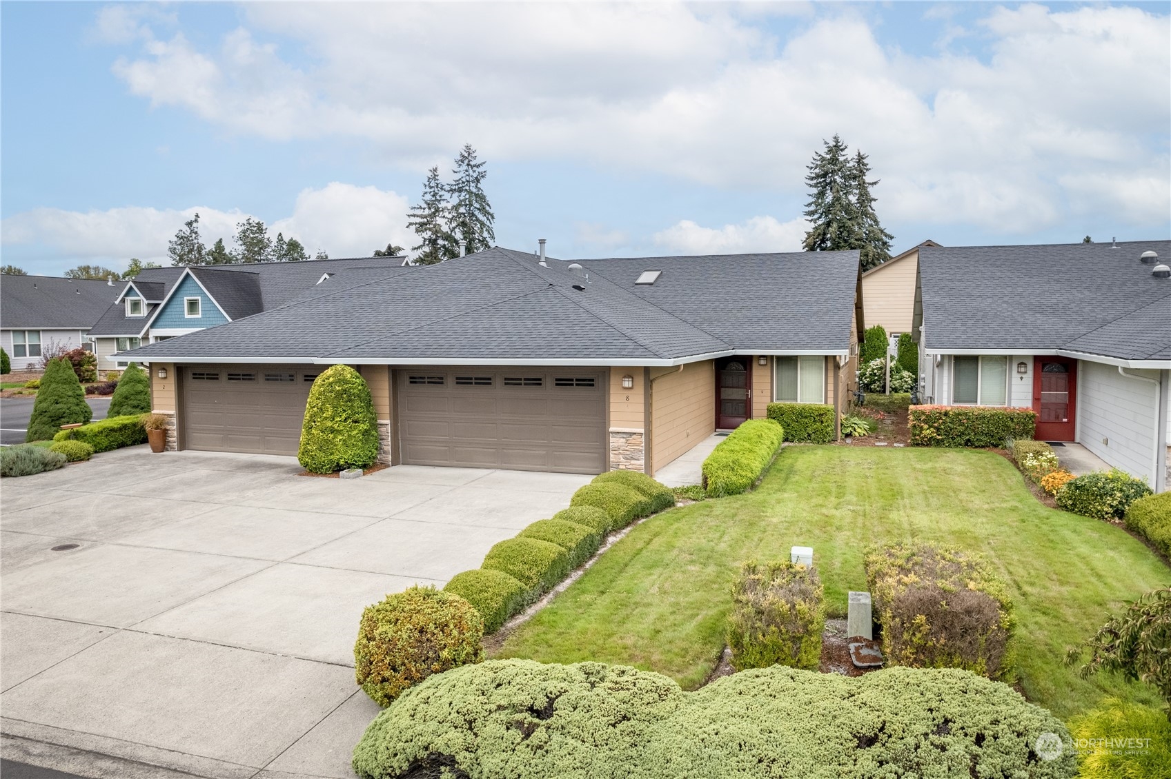 8 Willow Pointe Loop Longview, WA 98632 - Photo 2 of 29 a front view of a house with a yard and garage