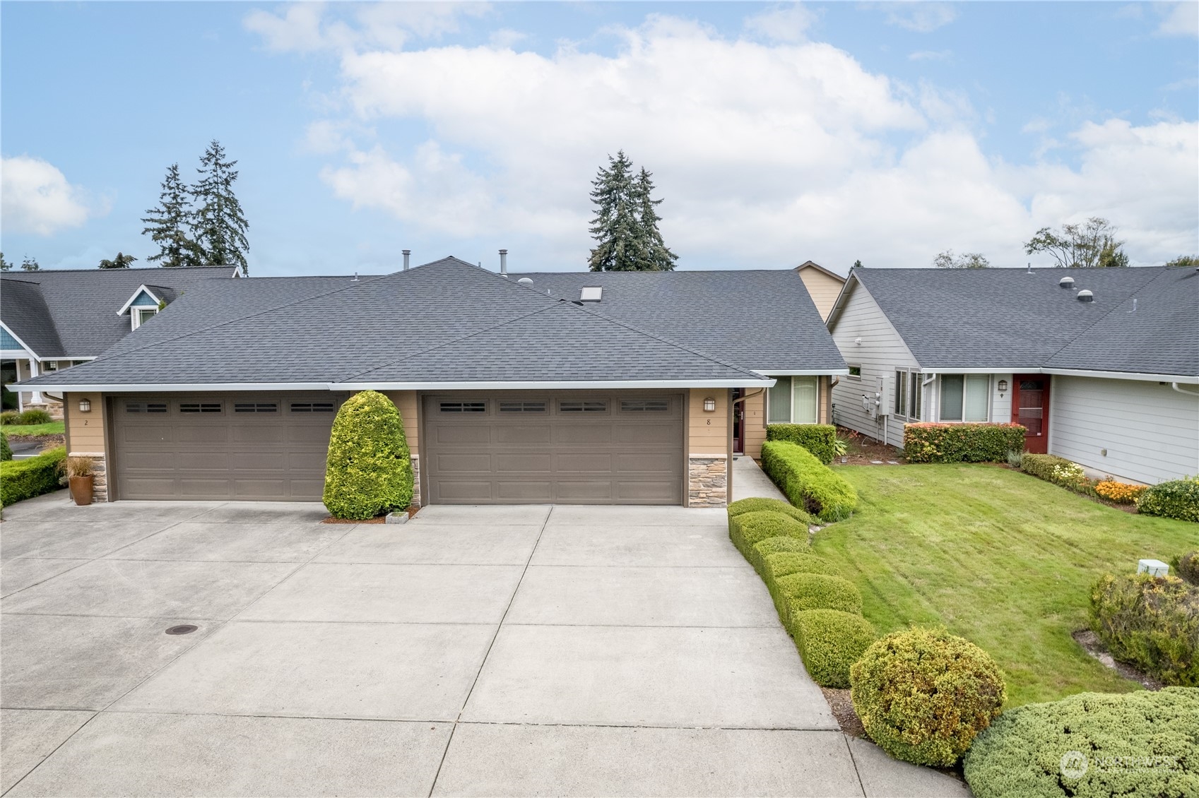 8 Willow Pointe Loop Longview, WA 98632 - Photo 3 of 29 a front view of a house with a yard and garage
