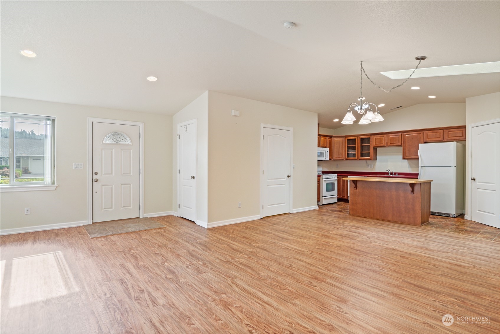 8 Willow Pointe Loop Longview, WA 98632 - Photo 6 of 29 a view of a kitchen with a sink and a refrigerator