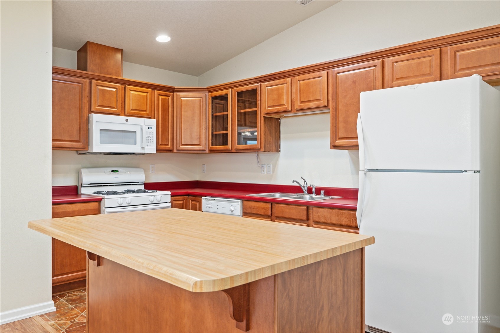 8 Willow Pointe Loop Longview, WA 98632 - Photo 7 of 29 a kitchen with a appliances a sink and a refrigerator