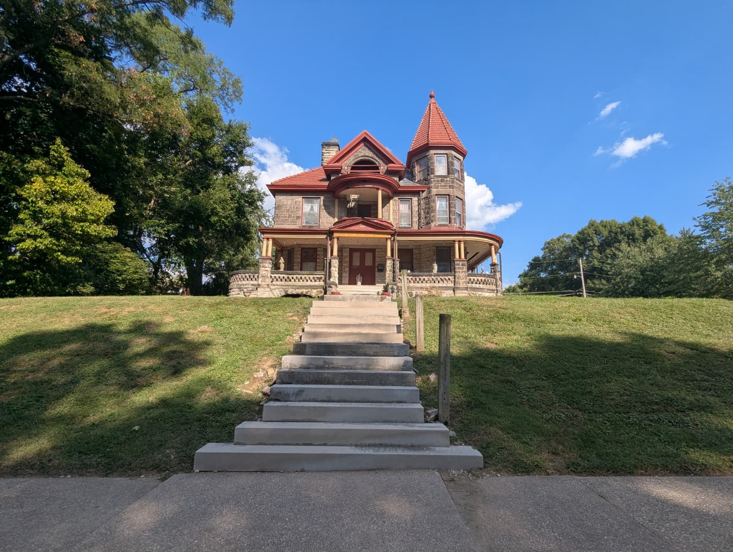 1635 20th Street Rock Island, IL 61201 - Photo 1 of 25 a front view of a house with a yard