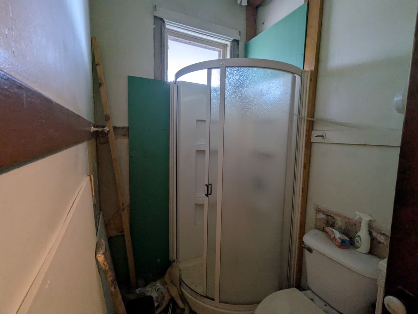 1635 20th Street Rock Island, IL 61201 - Photo 13 of 25 a bathroom with a glass shower door