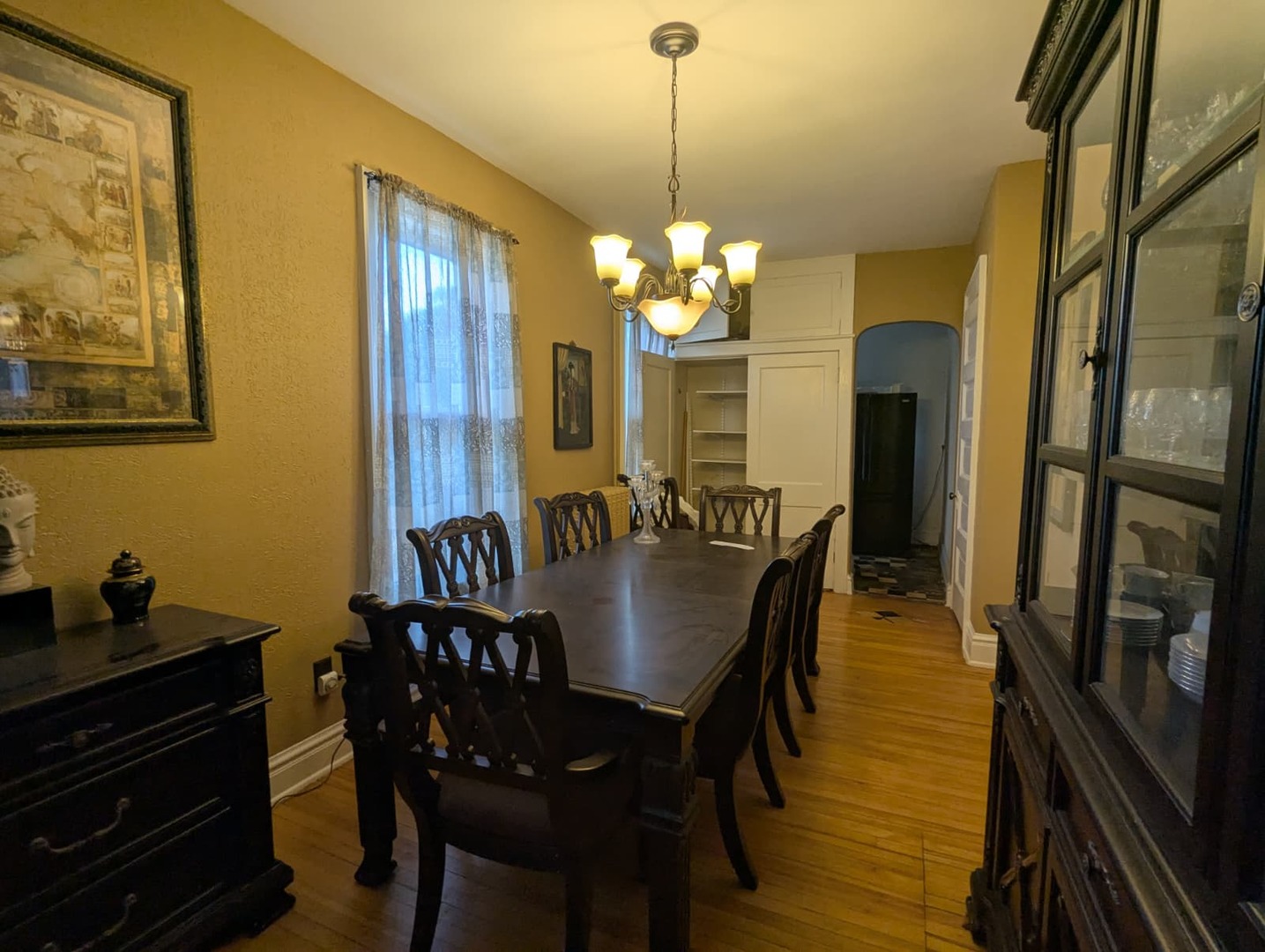 1635 20th Street Rock Island, IL 61201 - Photo 16 of 25 a view of a dining room with furniture window and wooden floor
