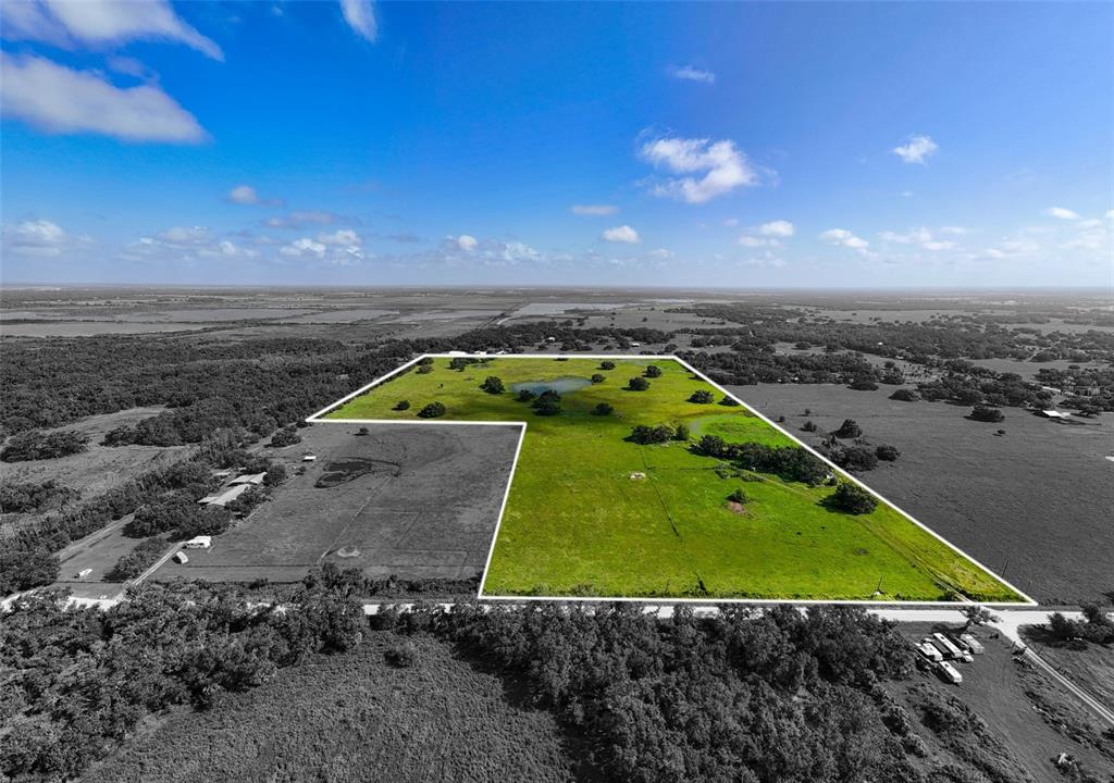 a view of a back yard of the house