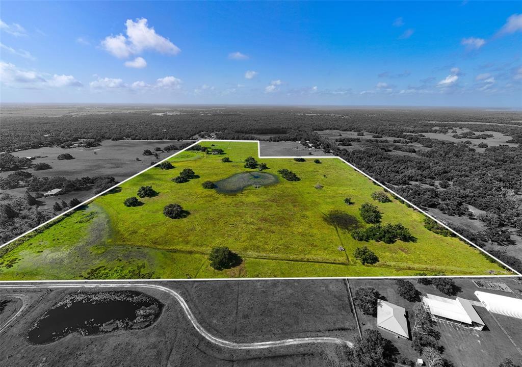 12950 River Road Myakka City, FL 34251 - Photo 26 of 32 an aerial view of a pool