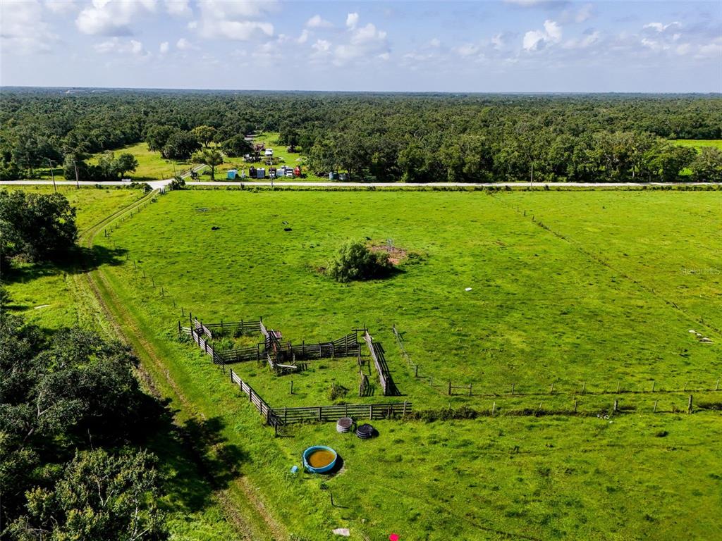 12950 River Road Myakka City, FL 34251 - Photo 30 of 32 a view of a golf course with a lake
