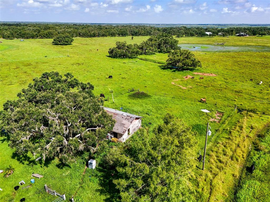 12950 River Road Myakka City, FL 34251 - Photo 3 of 32 a view of an ocean and a mountain