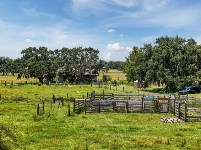 a view of a golf course with a park