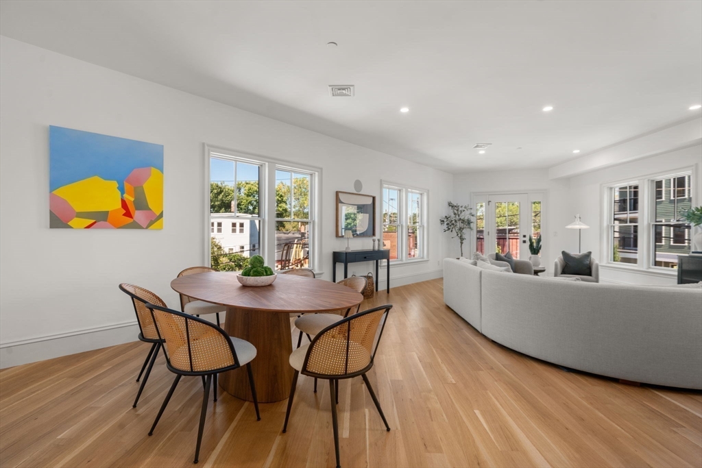 69 Williams Street, Unit 202 Boston, MA 02130 - Photo 11 of 22 a living room with furniture and a window