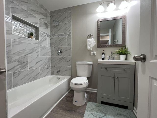 5174 Independence Avenue Portage, IN 46368 - Photo 15 of 26 a bathroom with a sink toilet and shower